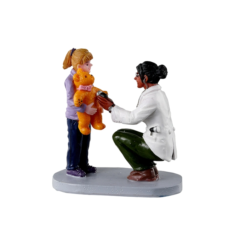 FIGURA VETERINARIA CON NIÑA